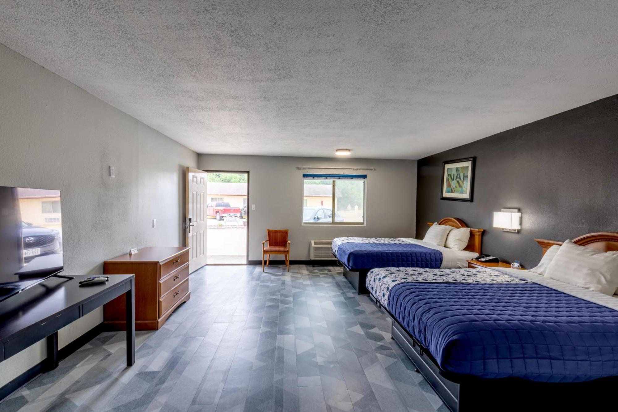 Freer Executive Inn And Studios 外观 照片